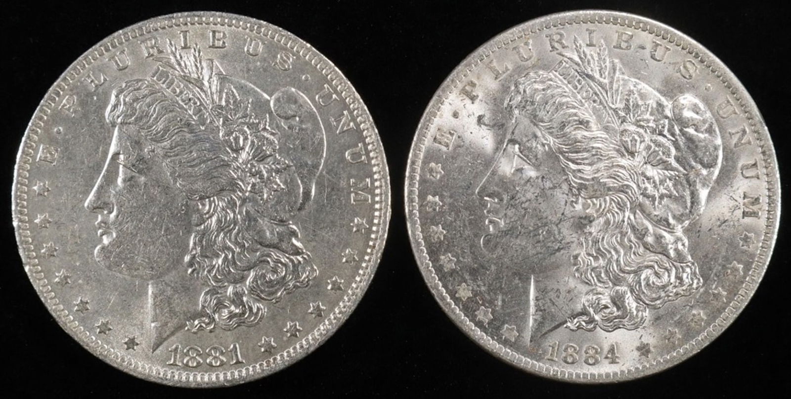 1881-O & 1884-O MORGAN DOLLARS BU: CHECK OUT OUR UPCOMING AUCTIONS ESTIMATE $110 - $160.