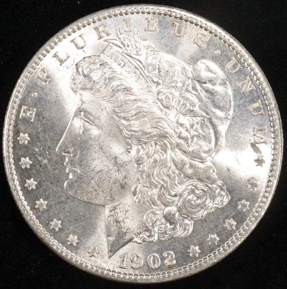 1902-O MORGAN DOLLAR BU: TOP RATED AUCTION HOUSE ESTIMATE $75 - $100.