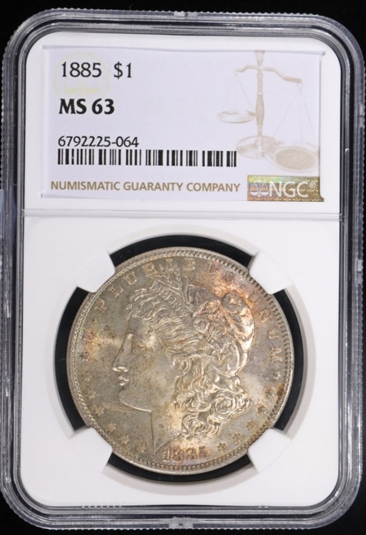 1885 MORGAN DOLLAR NGC MS63: TOP RATED AUCTION HOUSE ESTIMATE $110 - $160.