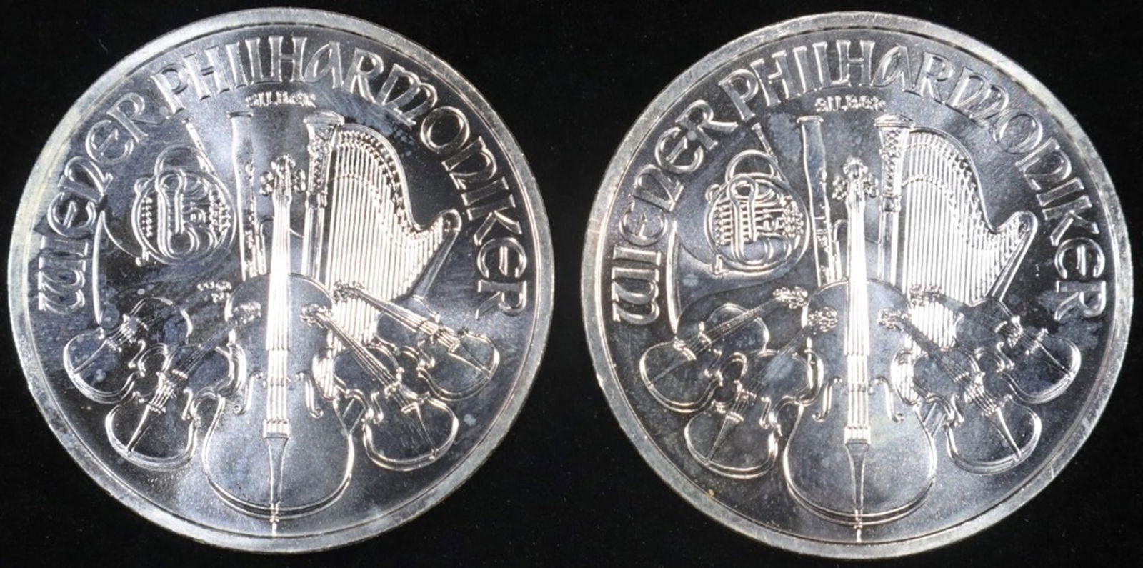 (2) 1 OZ .999 SILVER 2013 PHILHARMONIC ROUNDS (1 of 2)