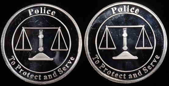 (2) 1 OZ .999 SILVER POLICE ROUNDS
