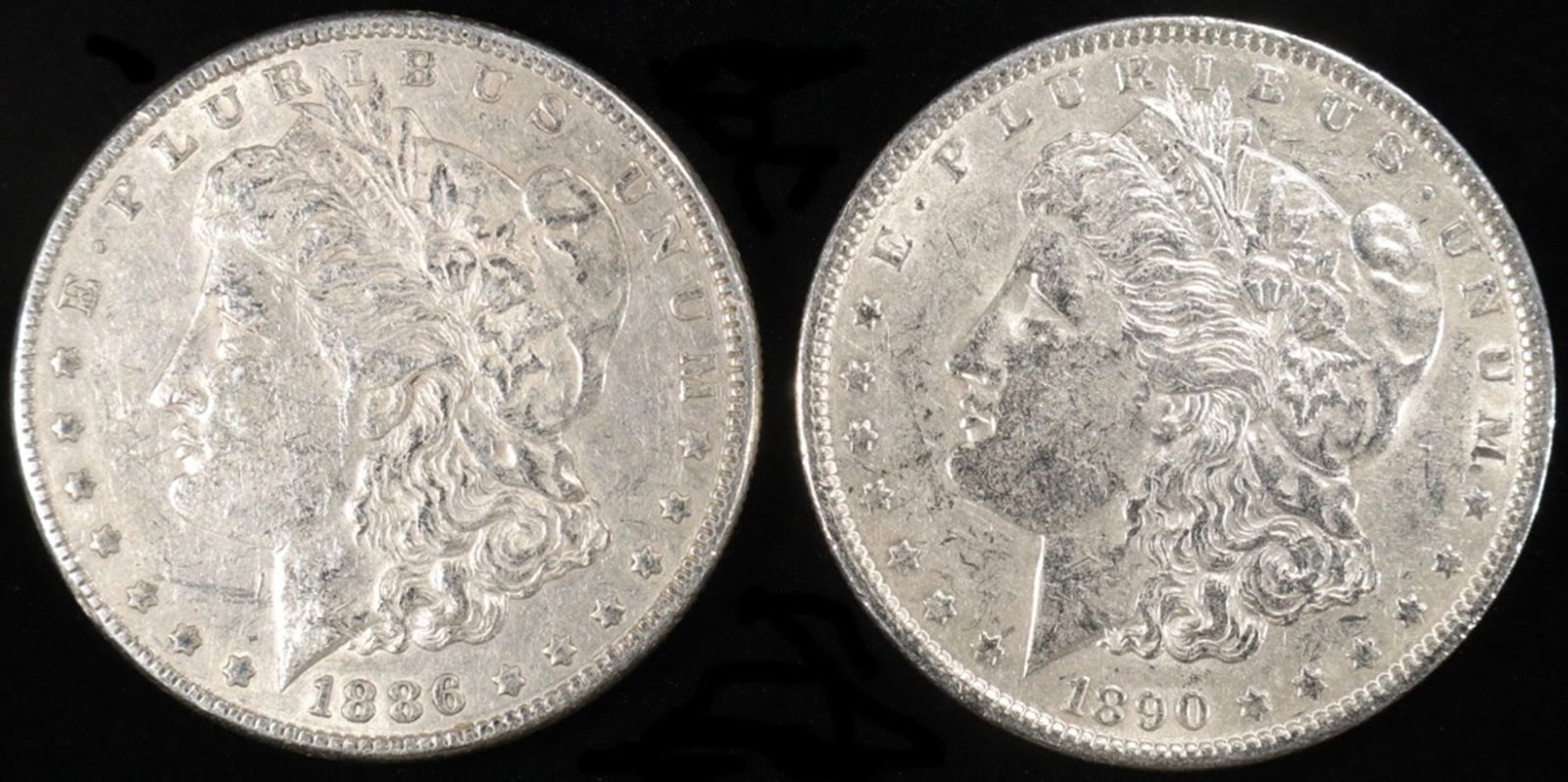 1886 & 1890 MORGAN DOLLARS XF/AU: WEEKLY COIN & CURRENCY AUCTIONS ESTIMATE $80 - $120.