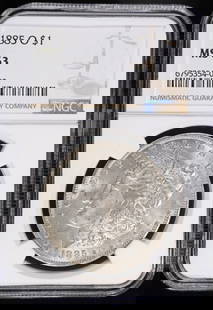 1885-O MORGAN DOLLAR NGC MS63: TOP RATED AUCTION HOUSE ESTIMATE $110 - $160.