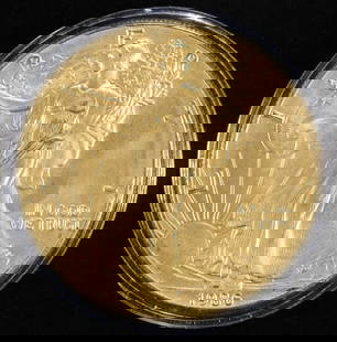 1986 AMERICAN SILVER EAGLE 24K GOLD PLATED: BID WITH SILVER CITY AUCTIONS ESTIMATE $140 - $190.