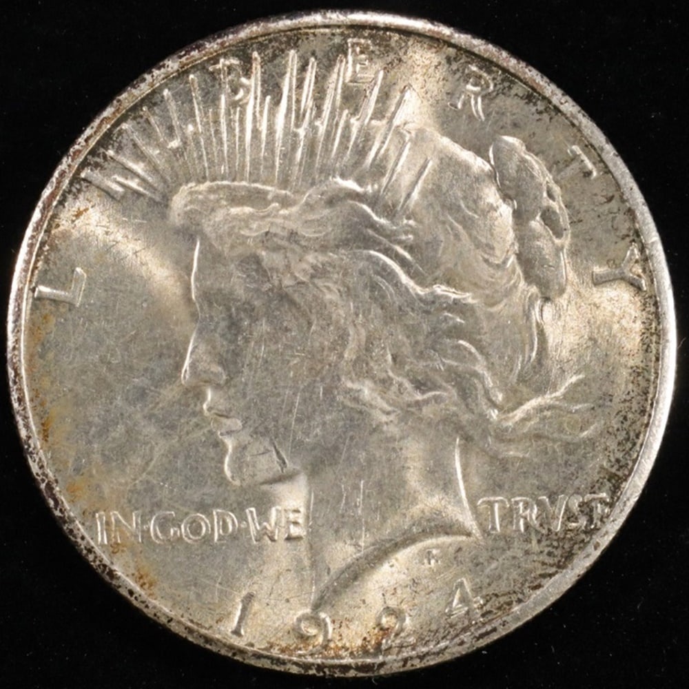 1924-S PEACE DOLLAR BU: WEEKLY COIN & CURRENCY AUCTIONS ESTIMATE $350 - $400.