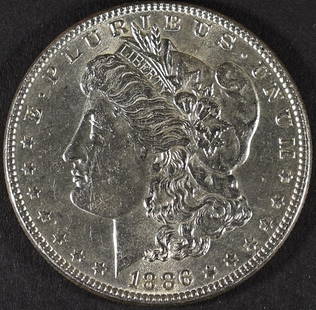 1886 MORGAN DOLLAR BU: CHECK OUT OUR UPCOMING AUCTIONS ESTIMATE $75 - $100.