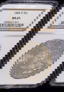1884-O MORGAN DOLLAR NGC MS65: TOP RATED AUCTION HOUSE ESTIMATE $200 - $250.