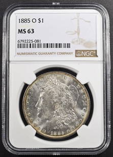 1885-O MORGAN DOLLAR NGC MS63: CHECK OUT OUR UPCOMING AUCTIONS ESTIMATE $110 - $160.
