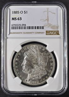 1885-O MORGAN DOLLAR NGC MS63: TOP RATED AUCTION HOUSE ESTIMATE $110 - $160.