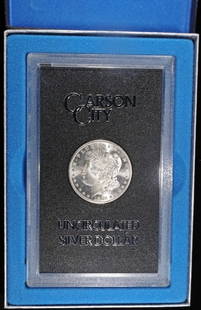 1882-CC MORGAN DOLLAR GSA BOX & CERT: WEEKLY COIN & CURRENCY AUCTIONS ESTIMATE $350 - $400.