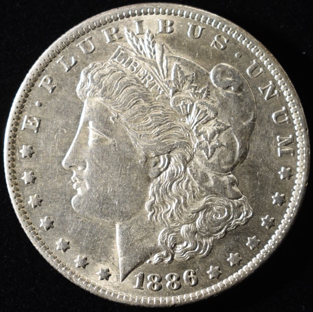 1886-O MORGAN DOLLAR BU: ESTIMATE $1100 - $1200.