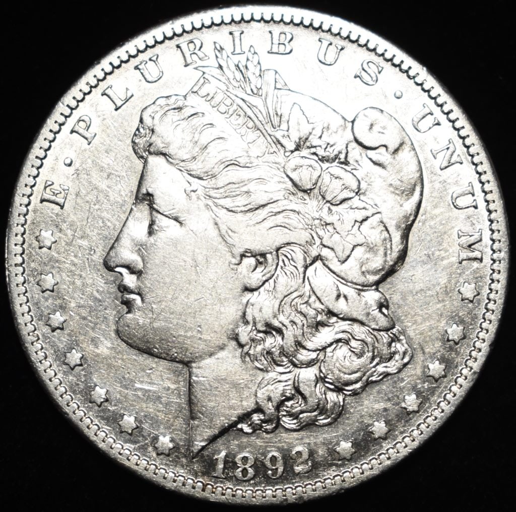 1892-S MORGAN DOLLAR AU: ESTIMATE $2000 - $2500.