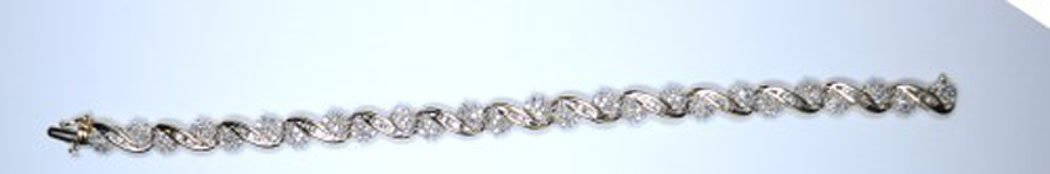 DIAMOND BRACELET 10KT, 7" 2 CTW: Low Estimate $400.00 High Estimate $500.00