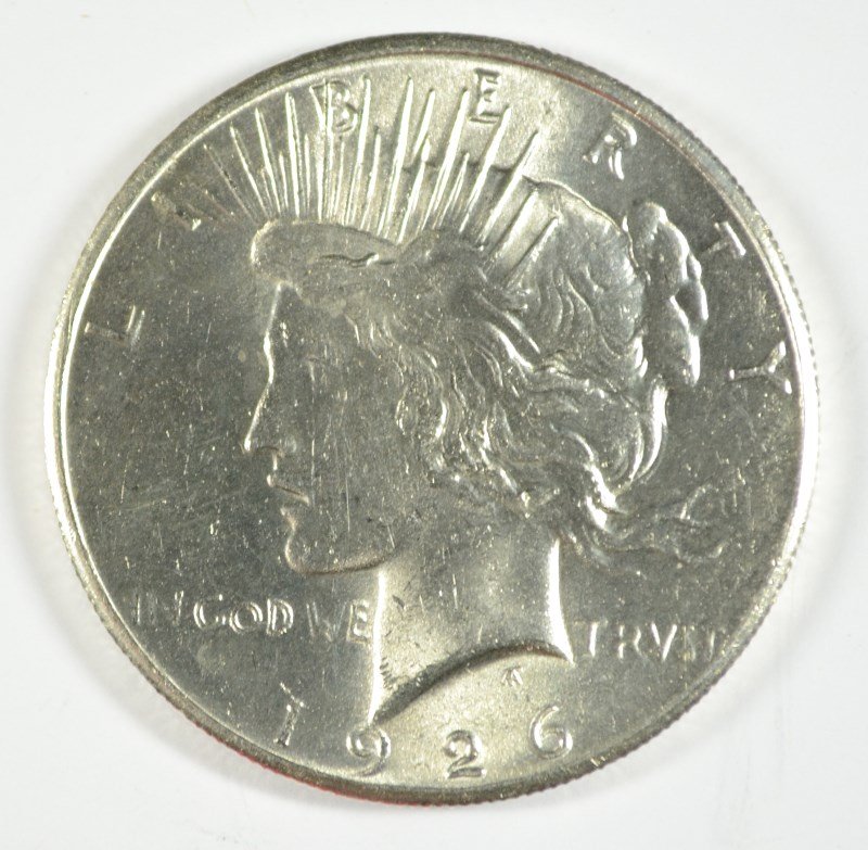 1926 PEACE DOLLAR AU: ESTIMATE $50 - $60. SILVERTOWNE AUCTIONS IS KNOWN FOR QUALITY & SERVICE. REGISTER TO BID!