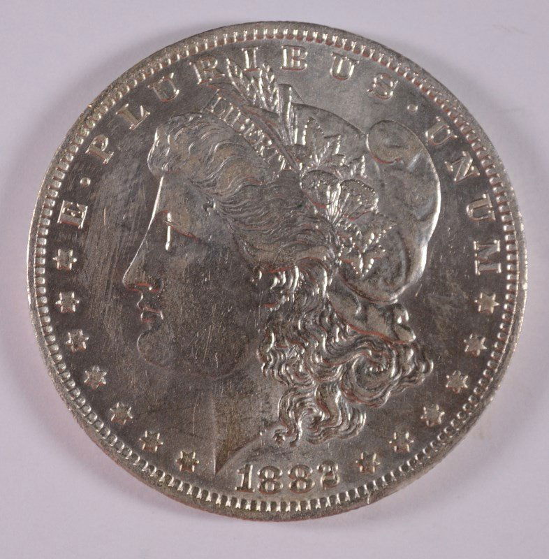 1882-O/S MORGAN DOLLAR AU-58 (1 of 2)