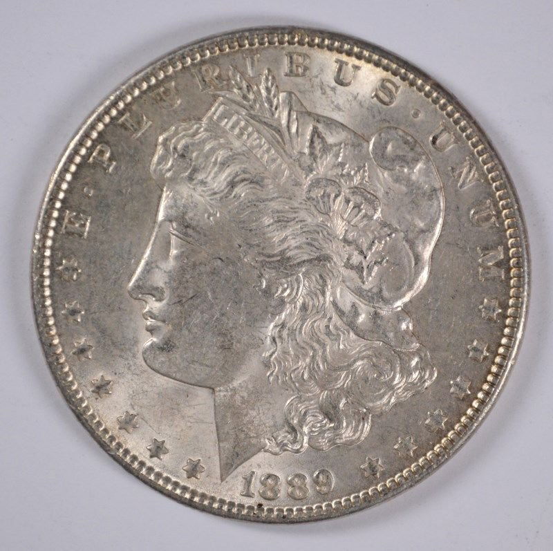 1889 MORGAN SILVER DOLLAR, CHOICE BU (1 of 2)