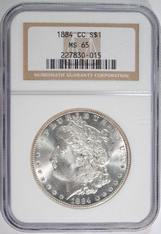 1884-CC MORGAN SILVER DOLLAR NGC MS65: WE SHIP ITEMS WON WITHIN 48 HOURS OF RECEIPT OF PAYMENT ESTIMATE $500-$550