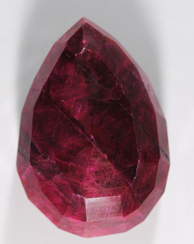 395 ct PEAR SHAPE RUBY GEMSTONE -  FACET CUT w / CRACK (1 of 2)