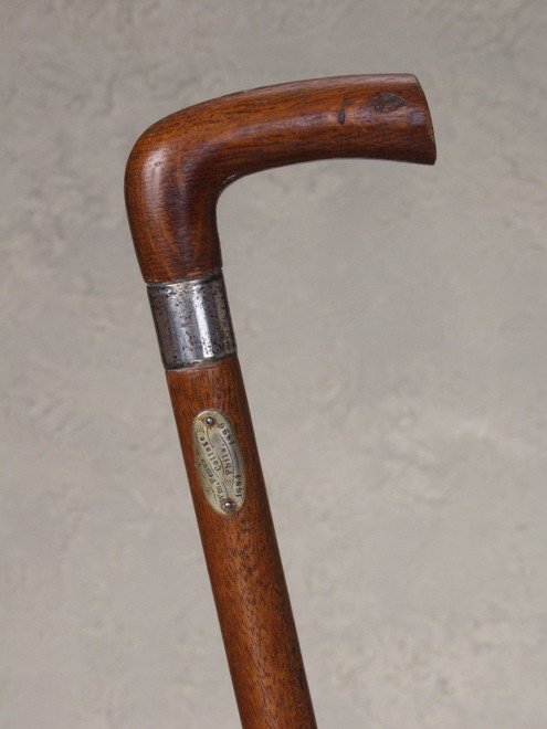 A fine William Penn relic cane from Philadelphia: A very fine William Penn relic cane from Philadelphia. Made from oak from the William Penn Cottage in Philadelphia, it has an "L" handle that is 2" high and 3 1/2" to the side. There is a 1" silver co