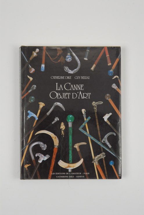A hardbound copy of La Canne Objet D'Art: A hardbound copy of La Canne Objet D'Art by Catherine Dike. Written in 1988 in collaboration with Guy Bezzaz, this large book is considered by most people to be the bible of decorative canes. Although
