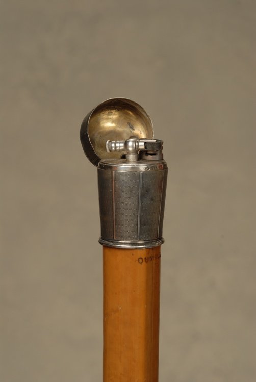 A scarce and important Dunhill lighter gadget cane