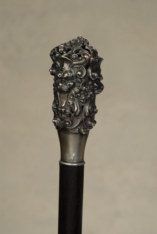 An outstanding silver Art Nouveau figural cane: An outstanding silver Art Nouveau figural cane. The reticulated silver knob handle is 3 1/3” high and 1 1/2” at its widest. It is marked “Sterling” with the maker’s mark of William B. Kerr &