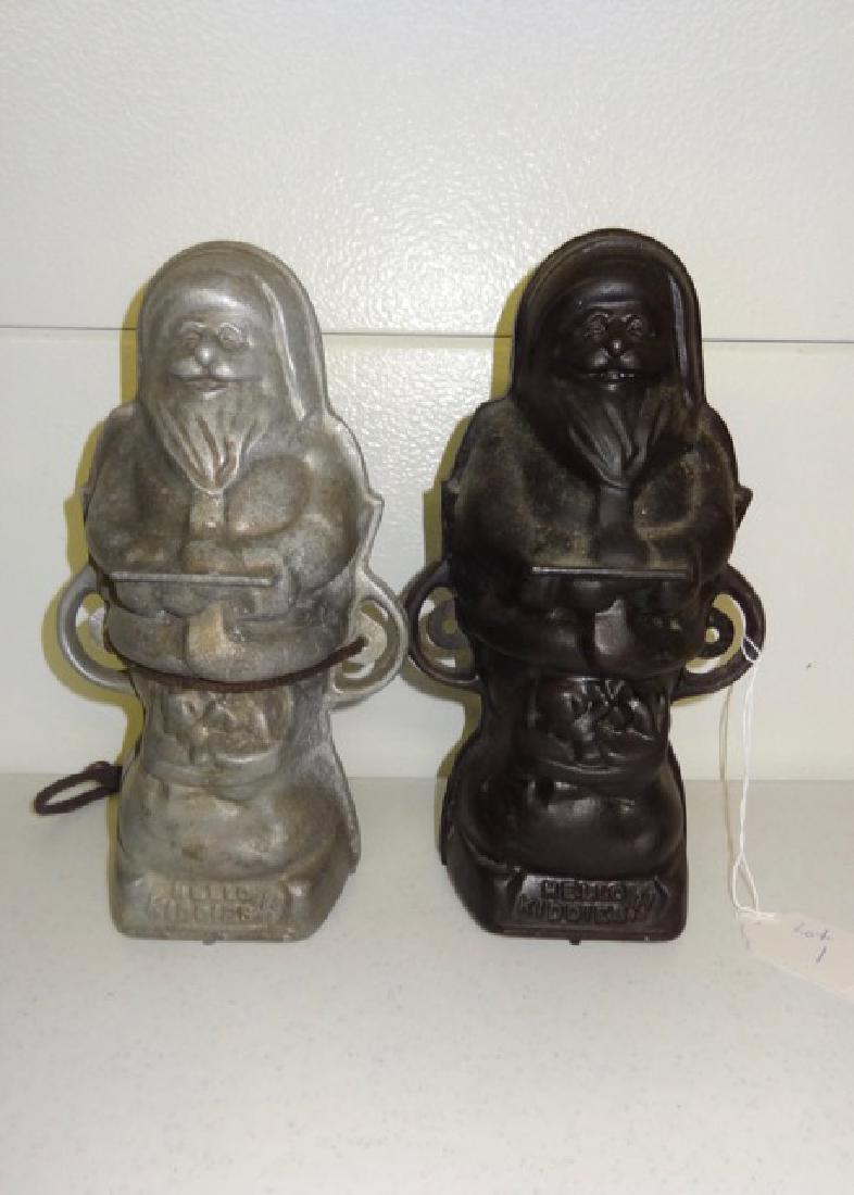 Two Griswald Santa Claus Molds (1 of 5)