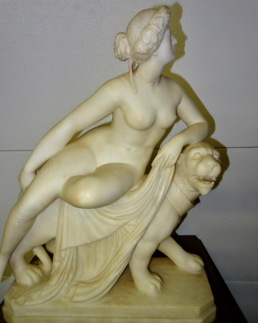 Large Neo Classic Marble Sculpture: Of a Woman on a Lion- 22" Tall X 17" Wide X 6" Deep- The neck and a foot have been repaired (Pictured)