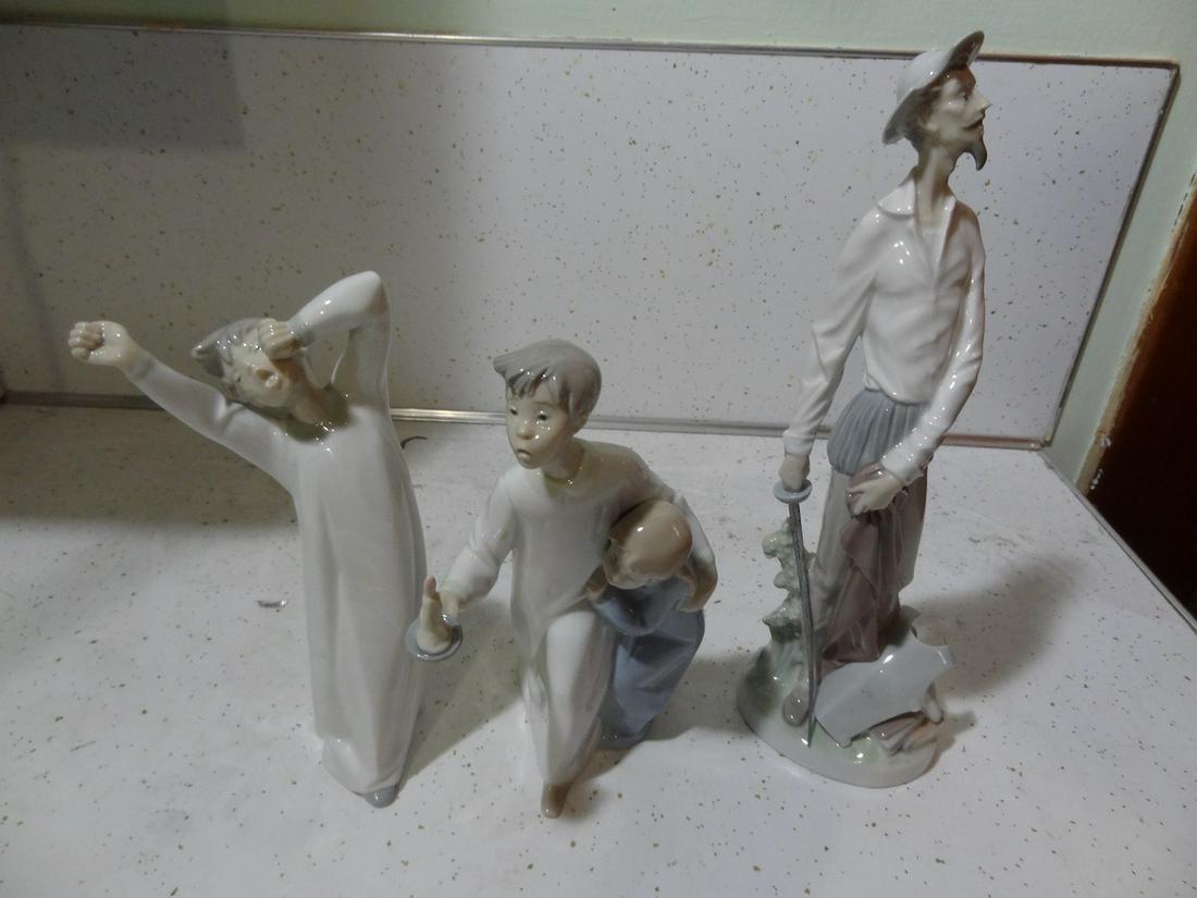 3 Lladro figures; 2 young boys & Don Quixote (1 of 3)