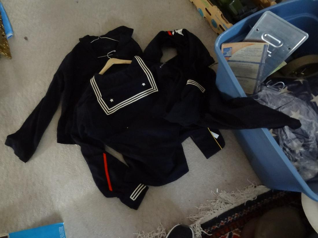 Blue container of old Navy uniforms (1 of 2)