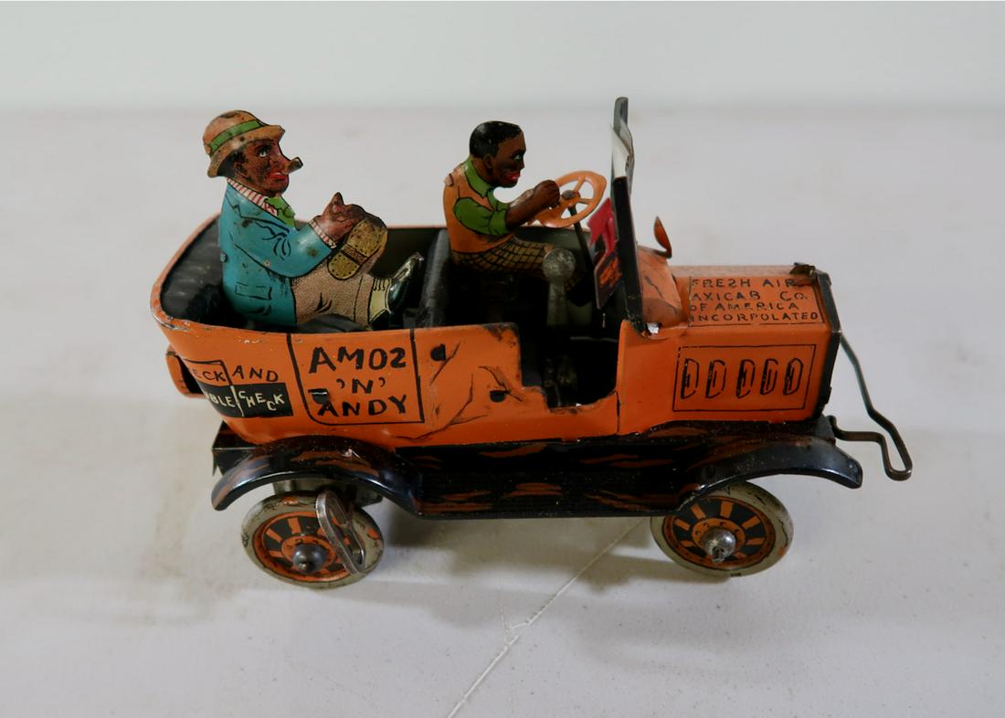 Amos & Andy Tin Wind Up Toy: 8" X 5" X 3 1/2" wide