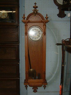 Oak Long Drop Ansonia Two Weight Wall Clock: Oak Long Drop Ansonia Two Weight Wall Clock- 52" Tall by 15" Wide Case. Refinished original weight and pendulum.