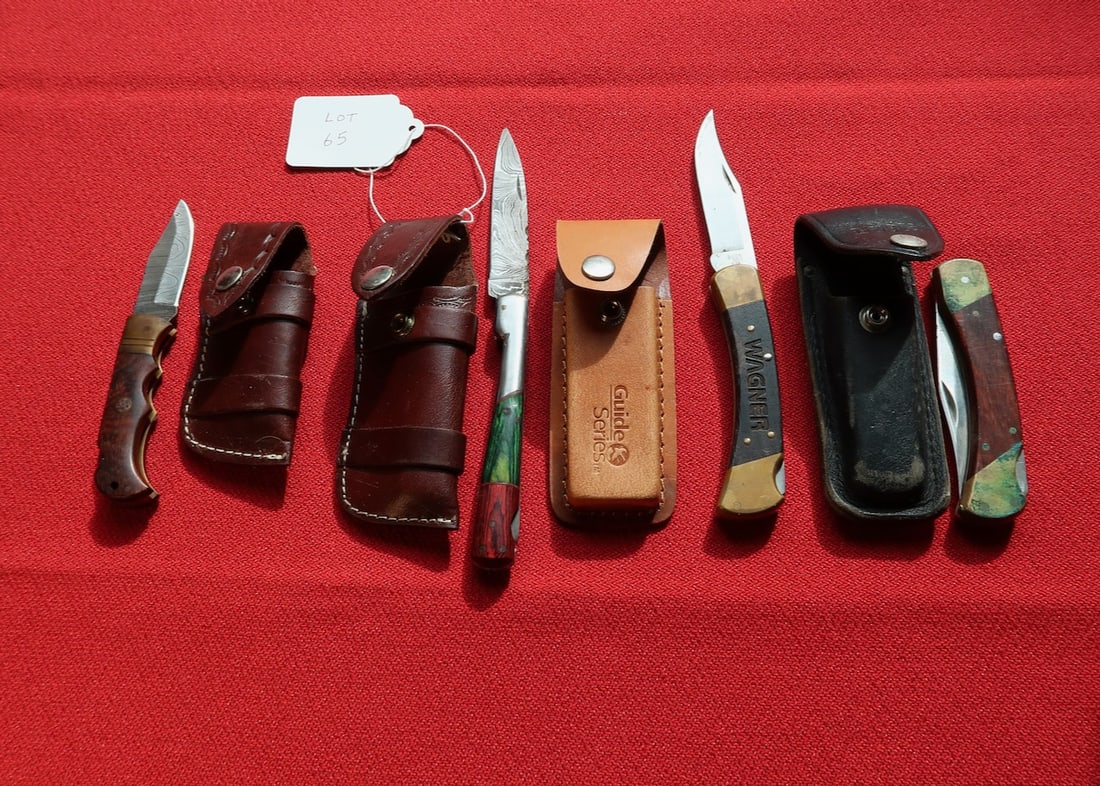 4 Buck Knives in Sheaths (1 of 3)
