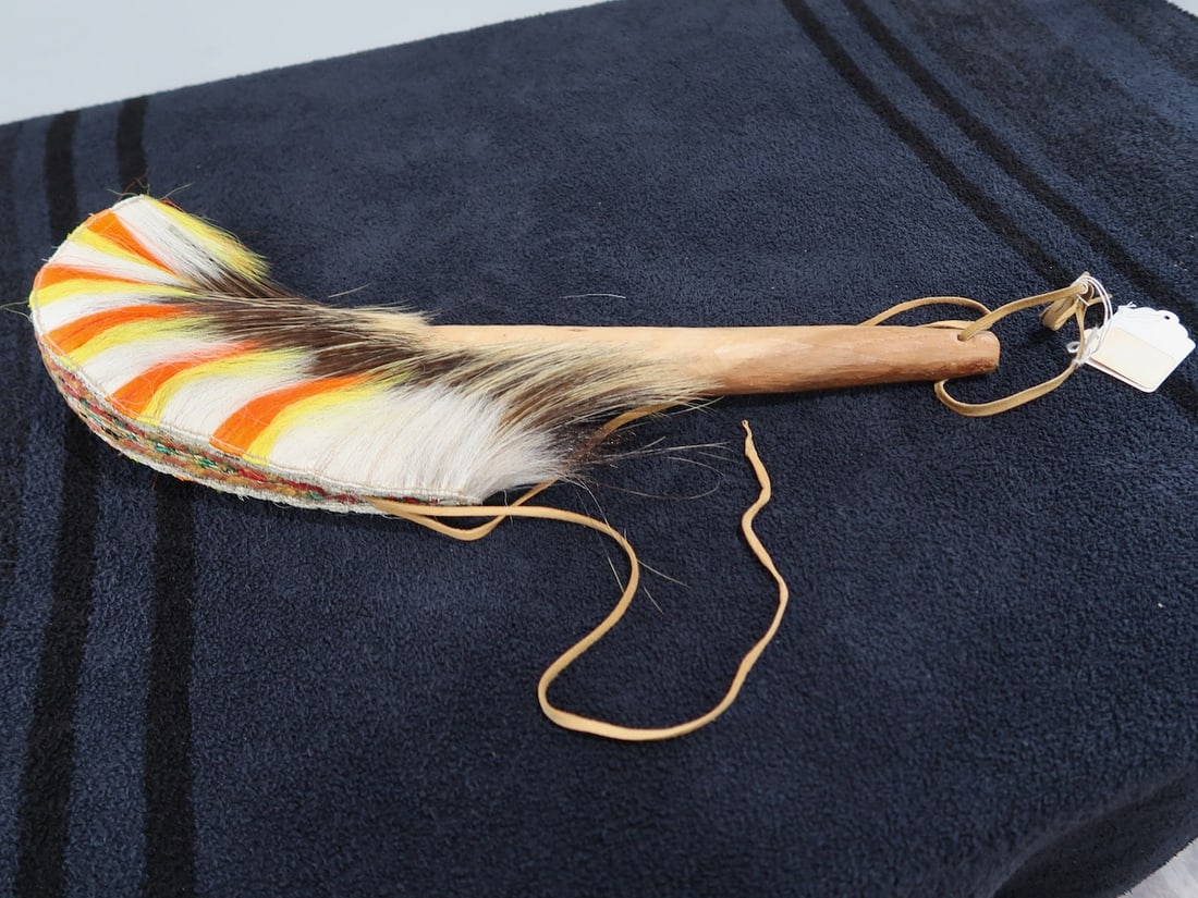 A Porcupine Roach Headdress: On Wood Base on which it is wrapped and stored - 21" L x 7" Deep