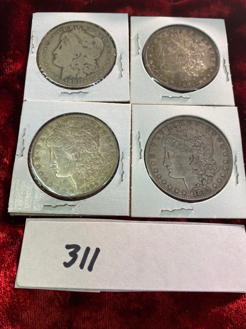 4 Silver Dollars- Dated; 1885, 1897, 1891, 1884 (1 of 2)