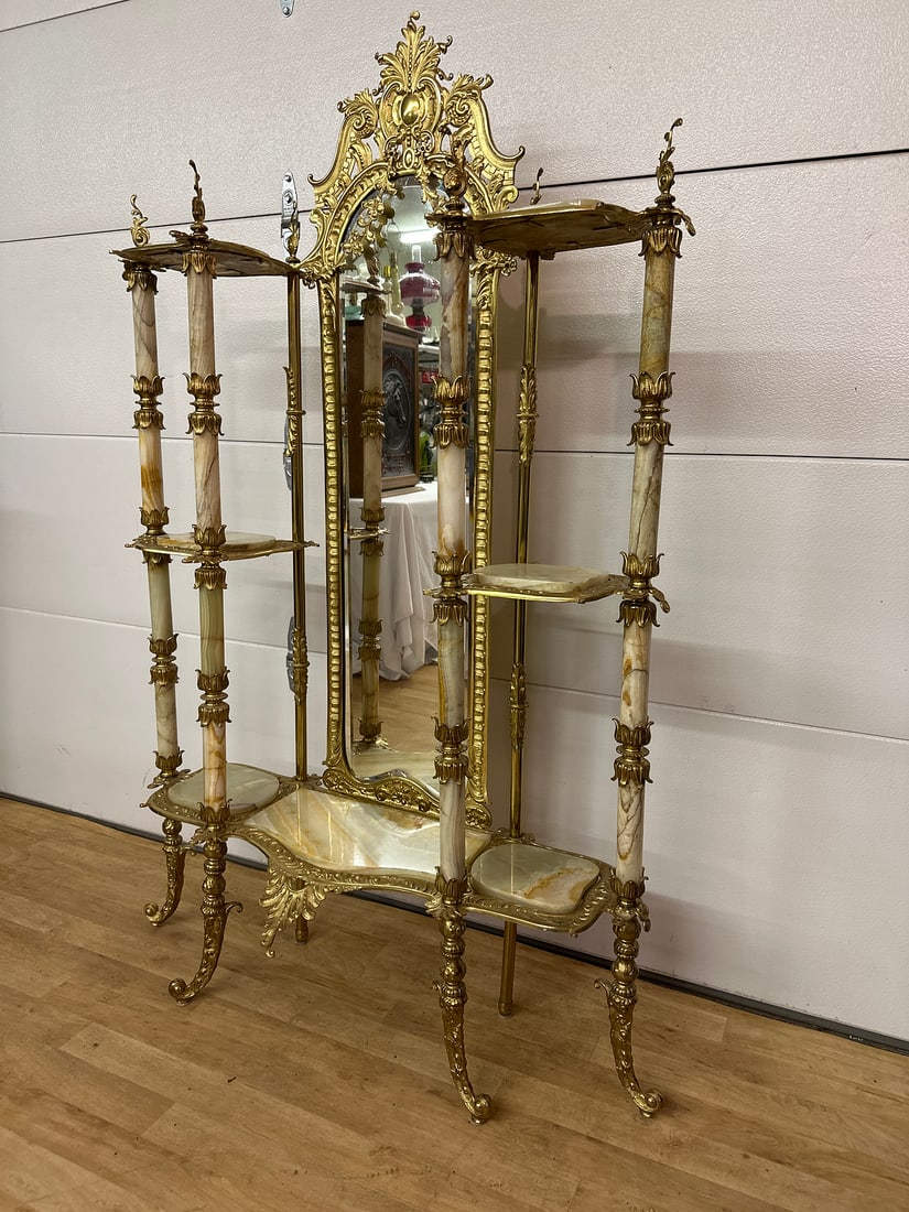 Bronze & Onyx Étagère: Elegant Rococo-inspired étagère with intricate gold metal detailing and marble shelves. The central mirror enhances its vintage charm, suitable for sophisticated interiors and antique collections. I