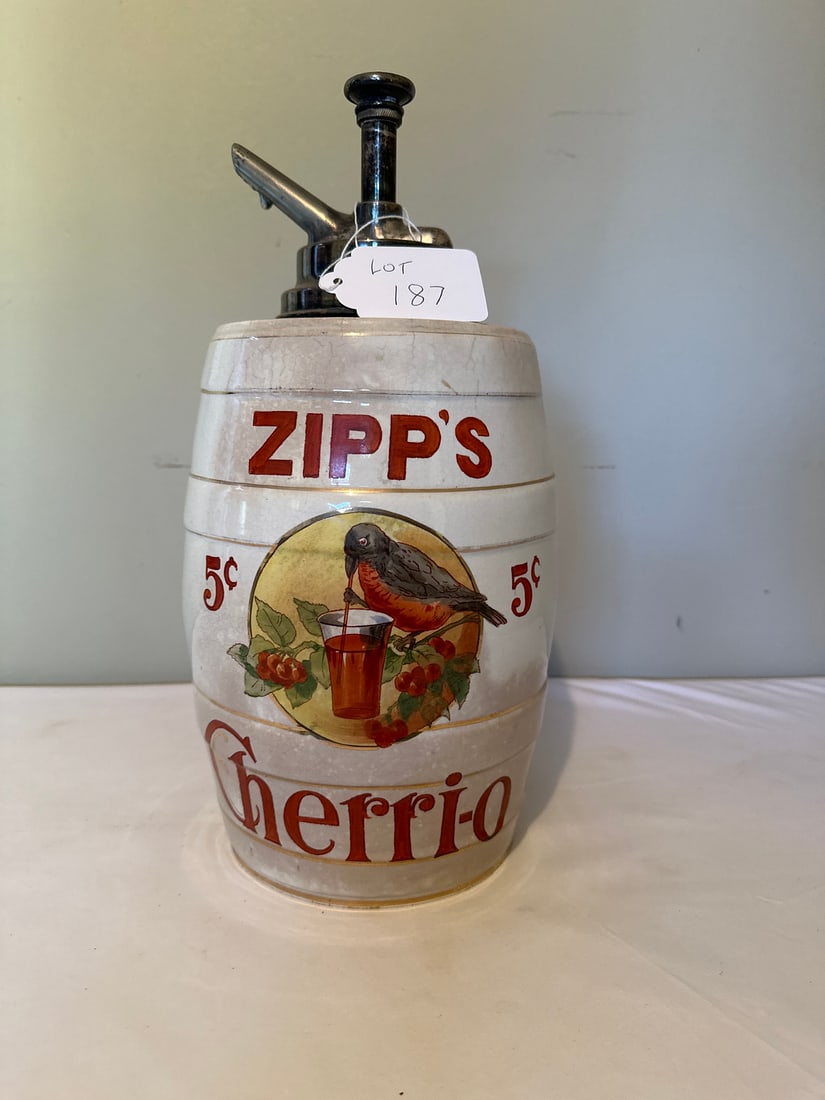 Fabulous Antique Zipp's Cherri-o Dispenser: Antique Zipp's Cherri-o ceramic beverage dispenser boasts a nostalgic design with a painted robin and cherries motif. Ideal for collectors of antique kitchenware, this piece showcases early 20th-centu