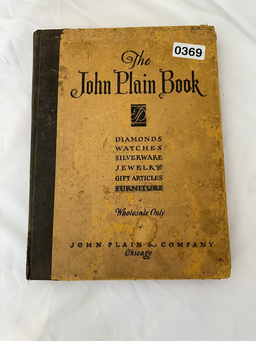 The John Plain Book - Vintage Wholesale Catalog: Explore this antique catalog from John Plain & Company, featuring an exquisite collection of diamonds, watches, silverware, jewelry, and more. Ideal for collectors and enthusiasts of vintage wholesale