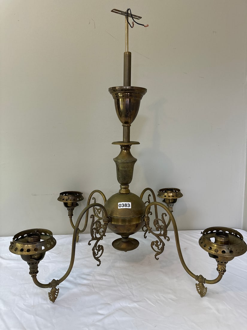 Vintage Brass 4-Arm Chandelier: Elegant vintage brass chandelier with intricate scrollwork and four arms. Perfect for adding a classic touch to any dining or living room. Ideal for antique enthusiasts and those looking to enhance th