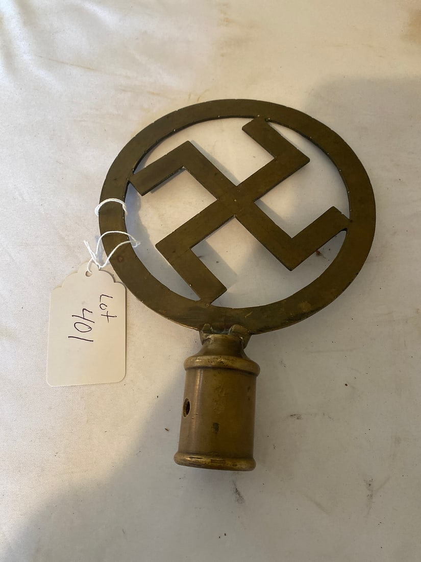 Vintage Brass Swastika Finial: Vintage brass finial featuring a swastika design. Ideal for collectors of historical memorabilia or architectural artifacts. The piece shows signs of age, enhancing its vintage appeal. Material: Brass