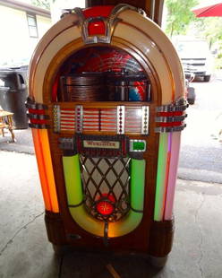 Wurlitzer 1015 Jute Box: Working Condition/ Lights up- 5 Ft.Tall X 32" Wide X 24" Deep