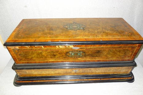 Large Cylinder Music Box in Inlaid Case: Some Small Chips on front of case- The comb & teeth are in good condition- The Music Box has been cleaned and everything is working. 3Ft. Long w 2 Extra Cylinders in Drawer