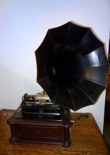 US Opera Phonograph w/Horn- Working Condition: 19" X 12" X 34" Tall w/ Horn- Small Shrinkage Crack in Cover. The phonograph is in working condition but doesn't play records correctly. Slight pot metal repair on one of the 2 needles reproducer look