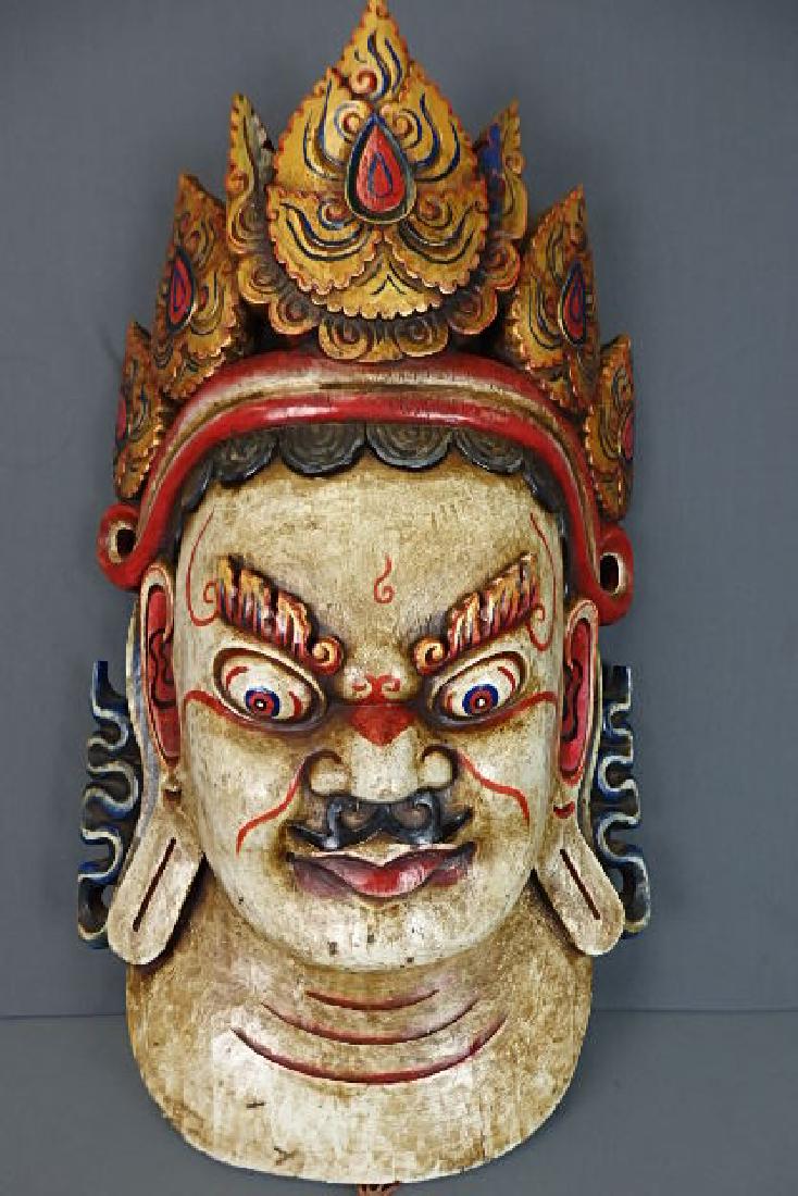 Padmasambhava Tibetian Mask: Was bought in 2013 for $670. Was hand carved in 1995 in Nepal. Made out of wood. 29 inches in length with a depth of of roughly 9 inches and it is roughly 16 inches wide. Still has residue of a wax se
