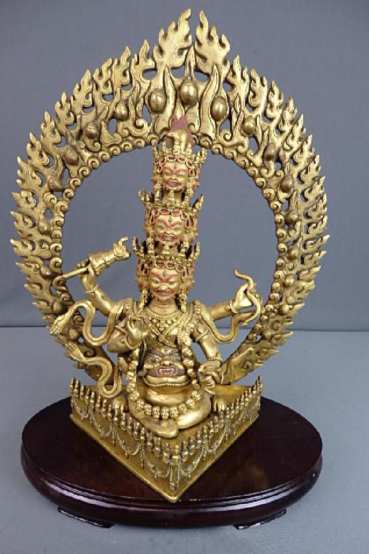 Rahula Gold Plated Statue: Sold in 2001 from the Tibet Ship in Finland for $750. Comes in 5 pieces. One is the wooden base, the golden ring, the gold plated base, the figure itself and the elephant scepter. Well detailed. Not i