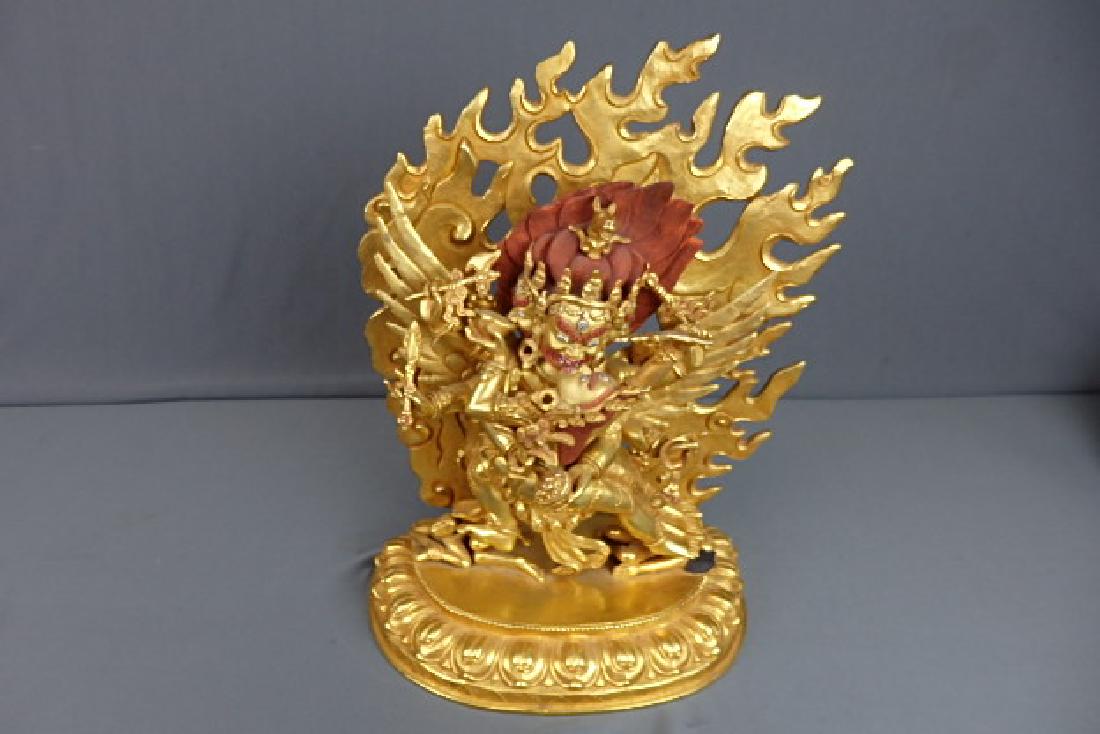 Hayagriva Statue: Was bought from the Tibet Shop in Finland for $1690. There is 3 pieces to this. The weapons are made separately but they can not be removed. The flaming arch, deity, and base are pieces. Stands 13 inc