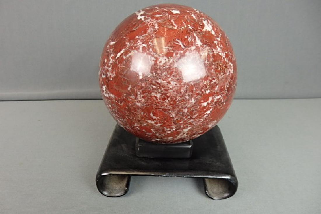 Large Garnett Ball with Stand: Comes with a wooden stand and a holder for the ball. No damage on the ball. Extremely heavy. The diameter of the ball is 5 inches.