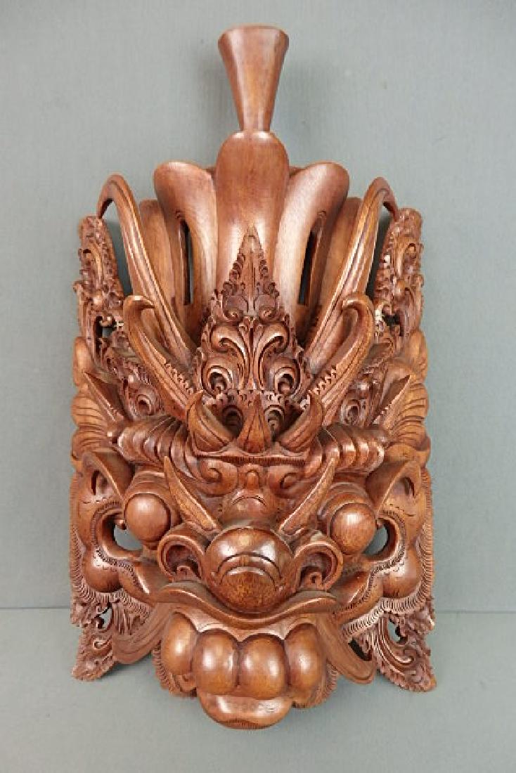 Wooden Pig God Mask Bali: From the Novica Collection Indonesia. No damage on it. Made out of wood. 18 inches in length, 11 inches wide and has a depth of 5.5 inches.