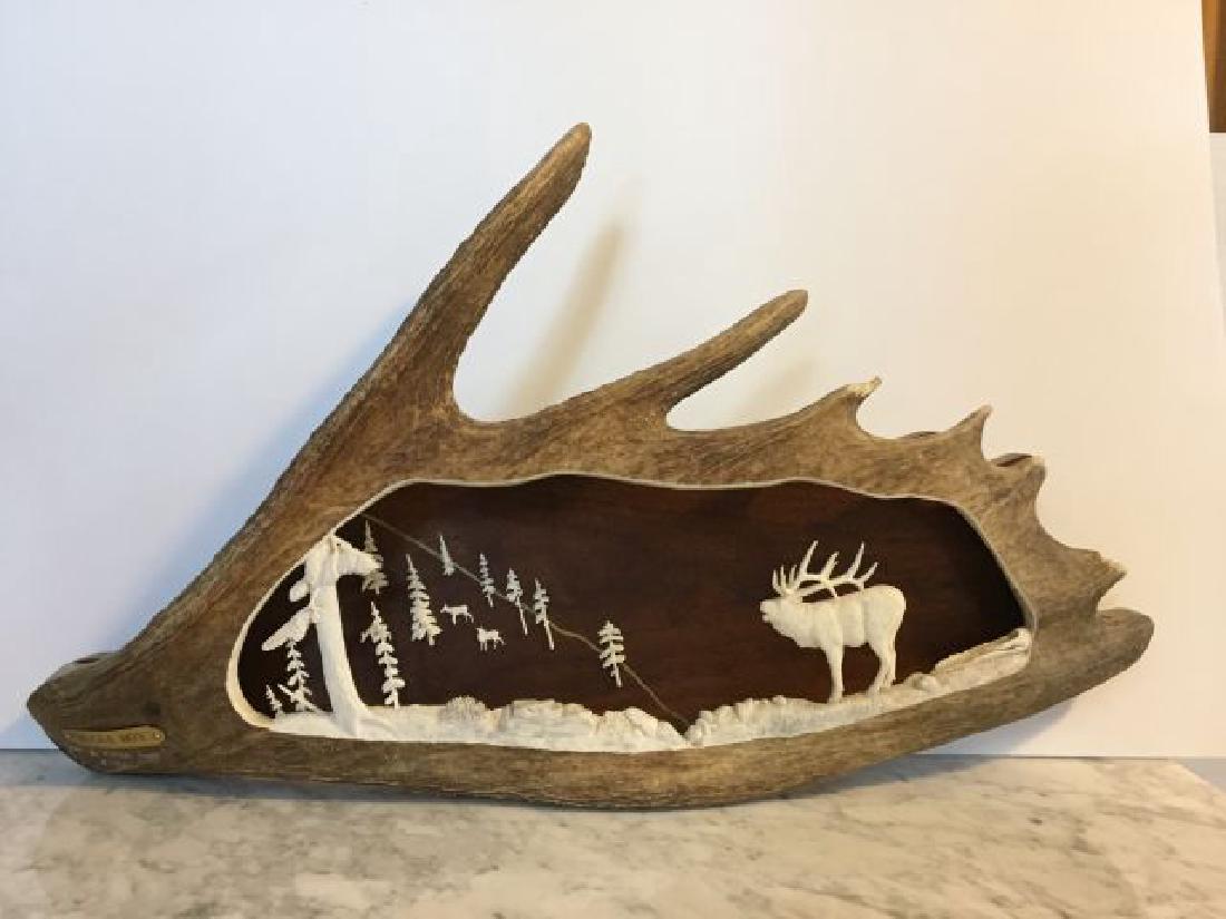 â€œBugle Boy" Moose Antler Carving: 3 dimensional wall carving, titled â€œBugle Boy" by Michael Kropp, 1996, owner of #1, series of 1, original artwork, measures 16.5" X 28.5"