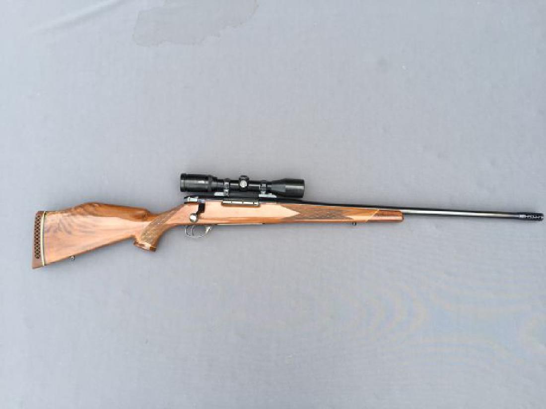 Weatherby Mark V Bolt Action: Weatherby Mark V Bolt Action, 300 W.M., has been fired, SN-H167860 with Zeiss Scope Diavari-c 3â€¦9 x 36